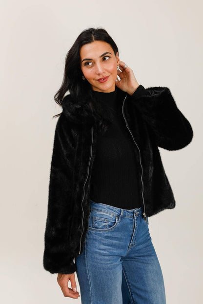 Veste avec col en fausse fourrure