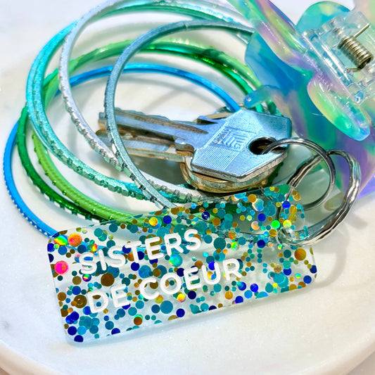 SISTERS DE COEUR Porte-clés à paillettes Plus de Love