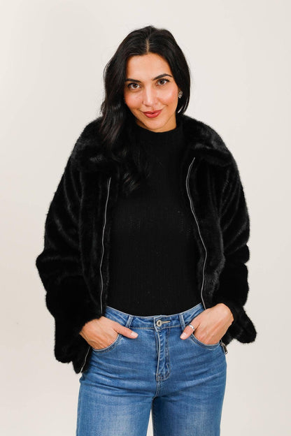 Veste avec col en fausse fourrure