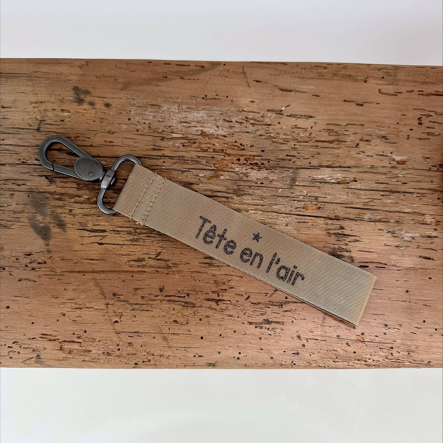 Porte clefs "Tête en l'Air" bronze