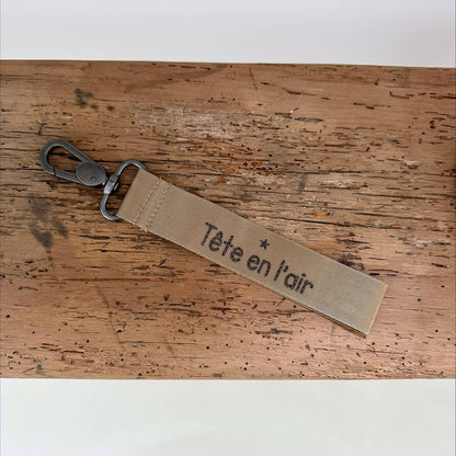 Porte clefs "Tête en l'Air" bronze