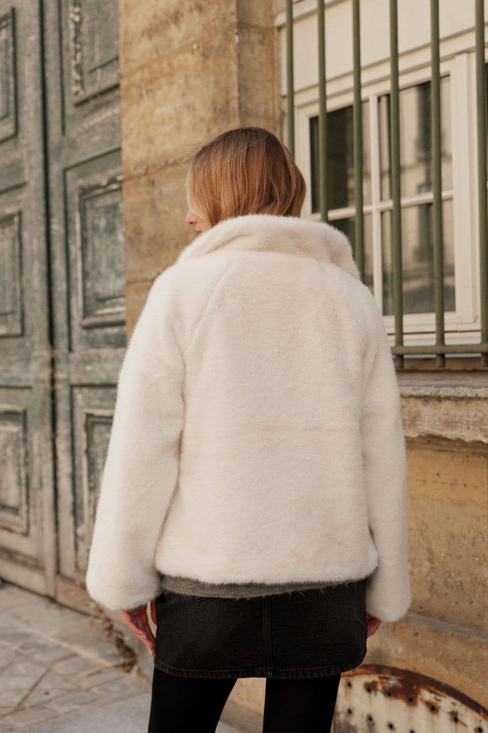 Veste avec col en fausse fourrure