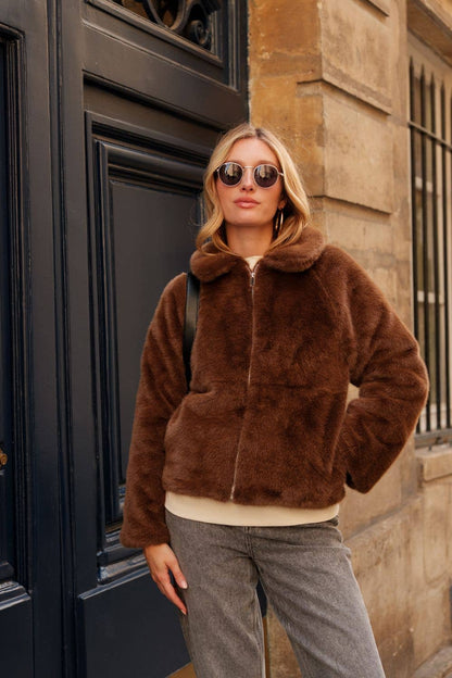 Veste avec col en fausse fourrure